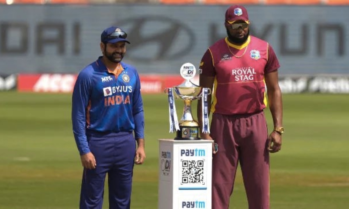 India and West Indies captains pose with the trophy