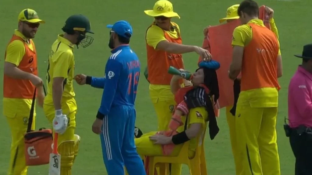 Steve Smith Sits On A Chair On The Field Due To The Rajkot Heat