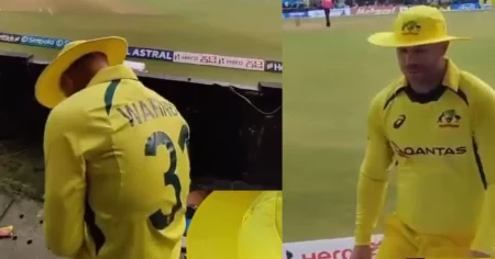 [VIDEO]: David Warner Jumps Over The Advertisement Board To Sign A Cap For A Fan